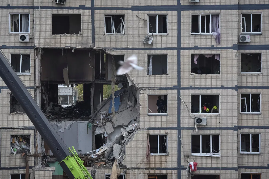 Apartment buildings in Dnipro, Ukraine, hit during a Russian drone strike on Nov 8.