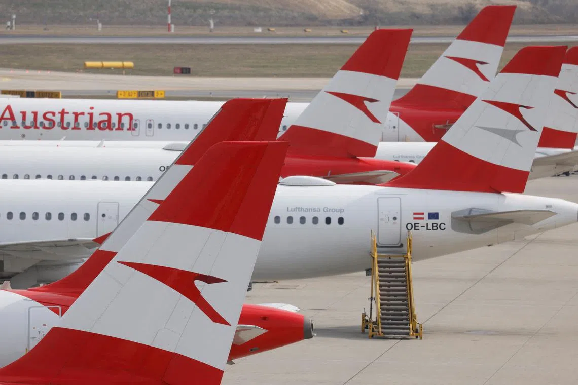 FILE PHOTO: Planes of Lufthansa subsidiary Austrian Airlines are pictured at Vienna International Airport in Schwechat, Austria, March 7, 2023. REUTERS/Leonhard Foeger/File Photo