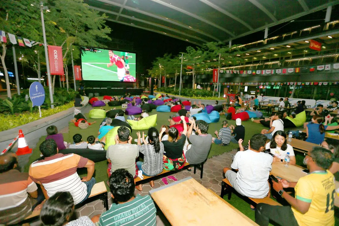 Fans watching a World Cup match at the OCBC Square at the Sports Hub in 2018. The Sports Hub will be one of the free viewing locations for the upcoming 2022 World Cup. 