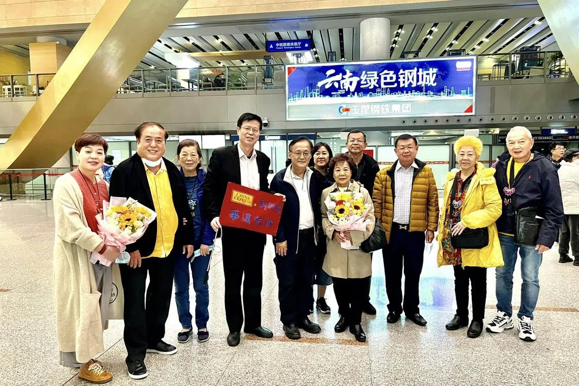 Former People’s Action Party MP Seng Han Thong (fifth from left) visited Yunnan and Guizhou provinces from Feb 25 to March 3 with 20 others, who included China Express Travel founder Li Liang Yi (fourth from left) and several other fellow retirees.