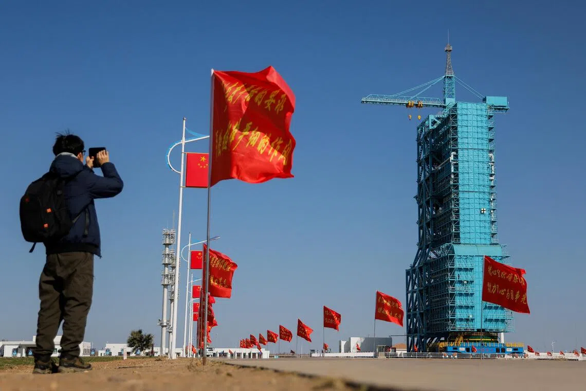 A successful reusable rocket test would require the rocket's large lower section, known as first stage or booster, to be landed and recovered after launch.