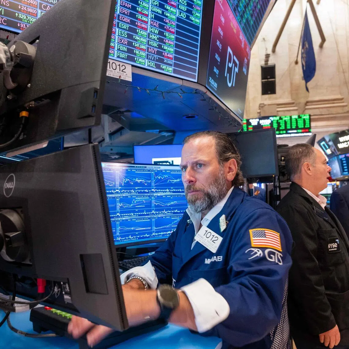Traders working on the floor of the New York Stock Exchange on July 21, in New York City.