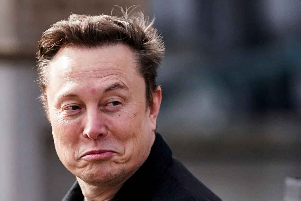 Elon Musk reacts, on the day he meets with Indian Prime Minister Narendra Modi at Blair House, in Washington, on Feb 13, 2025.