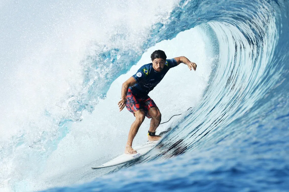 FILE PHOTO: Surfing - World Surf League - Tahiti Pro - Teahupo'o, Tahiti, French Polynesia - May 30, 2024  Brazil's Yago Dora in action during the round of 16 heat 3 REUTERS/Thomas Bevilacqua/File Photo