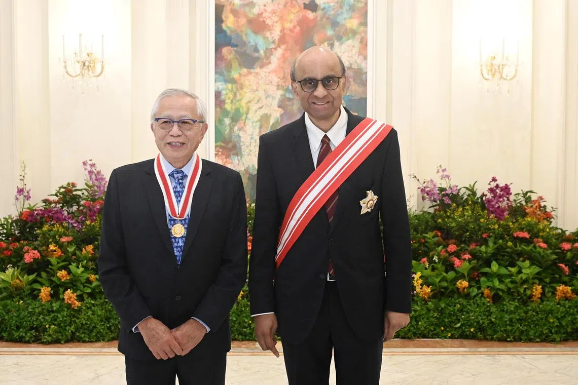 American Professor William Chin (left) was conferred the honorary citizenship award by President Tharman Shanmugaratnam on Oct 23.