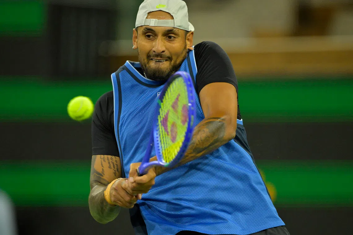 Mar 6, 2025; Indian Wells, CA, USA;  Nick Kyrgios (AUS) hits a shot against Botic Van De Zandschulp (not pictured) during his first round match of the BNP Paribas Open at the Indian Well Tennis Garden. Mandatory Credit: Jayne Kamin-Oncea-Imagn Images