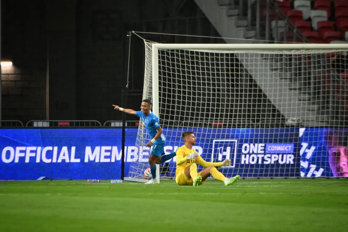 Shawal Anuar (in blue) celebrating after giving the Lion City Sailors an early lead against Tottenham Hotspur on Wednesday.