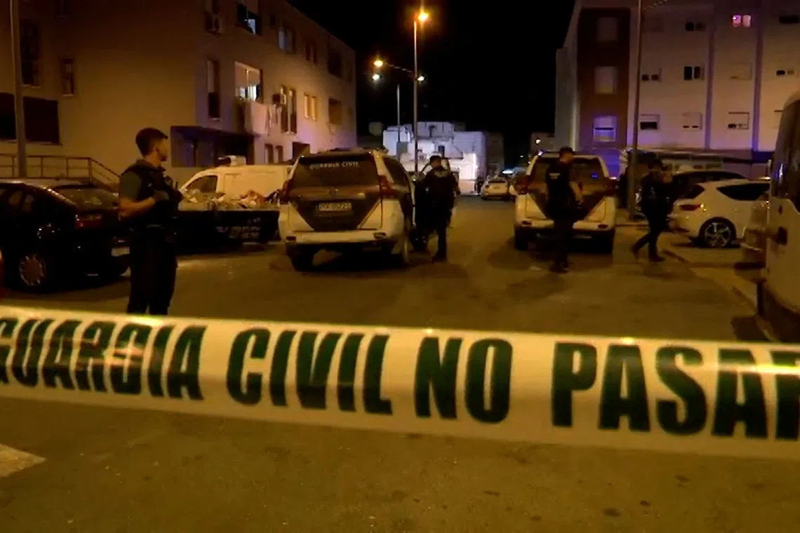 Police officers work at the crime scene where a suspected gang leader's mother-in-law, his pregnant sister and a teenager were killed in a drug-related shooting in Isla Cristina, Spain August 16, 2026. FORTA/Handout via REUTERS