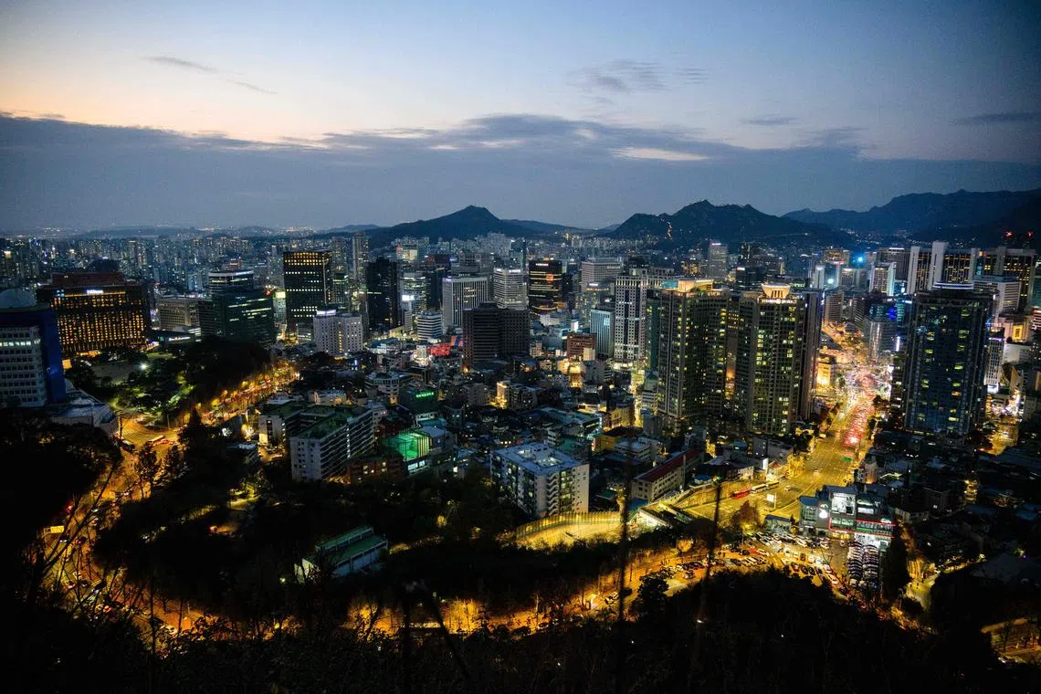 A view of buildings amid city lights in Seoul on Nov 19, 2022.