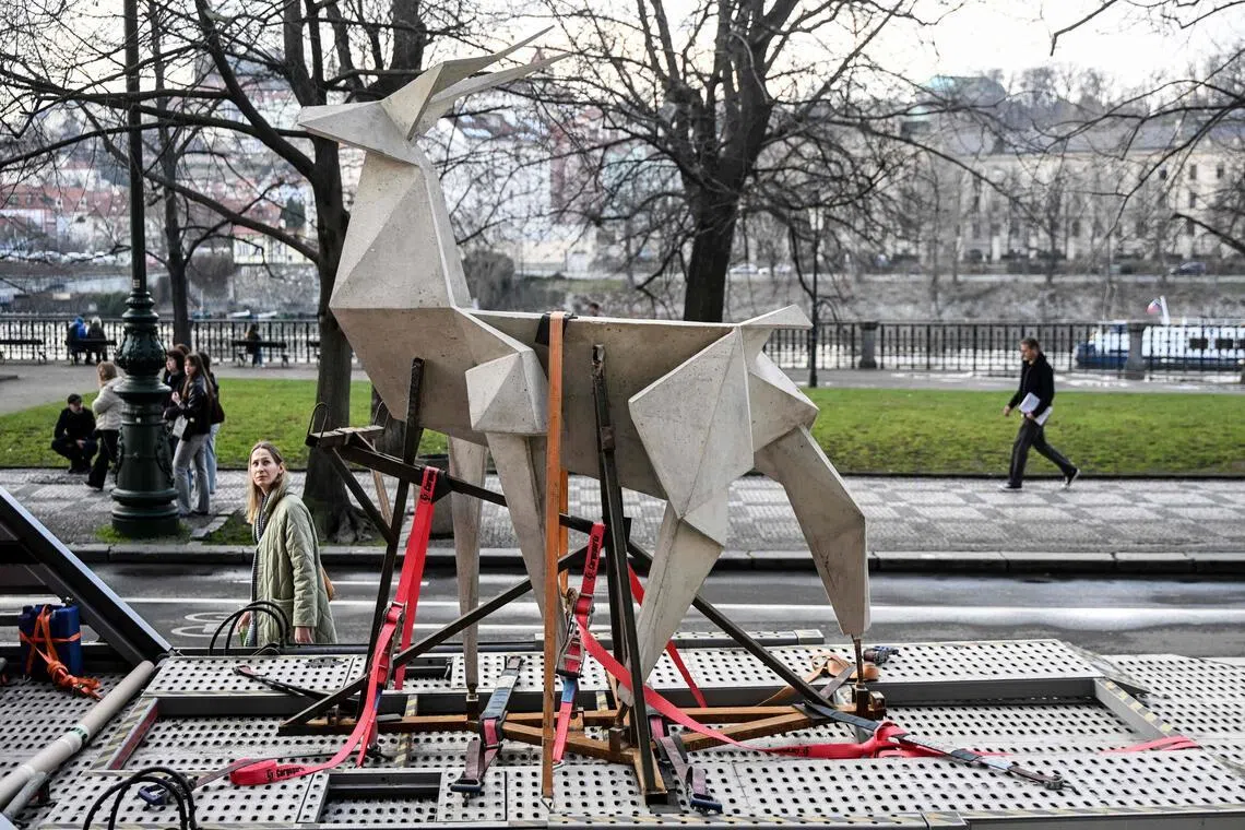Ukraine’s ‘Origami Deer’ sculpture rescued from frontline tours Europe