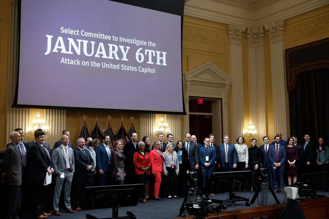  Staff members of the House Select Committee to Investigate the attack on the US Capitol pose for a group photo following the committee's last public hearing in the Canon House Office Building on Capitol Hill on Dec 19, 2022 in Washington, DC. via AFP)