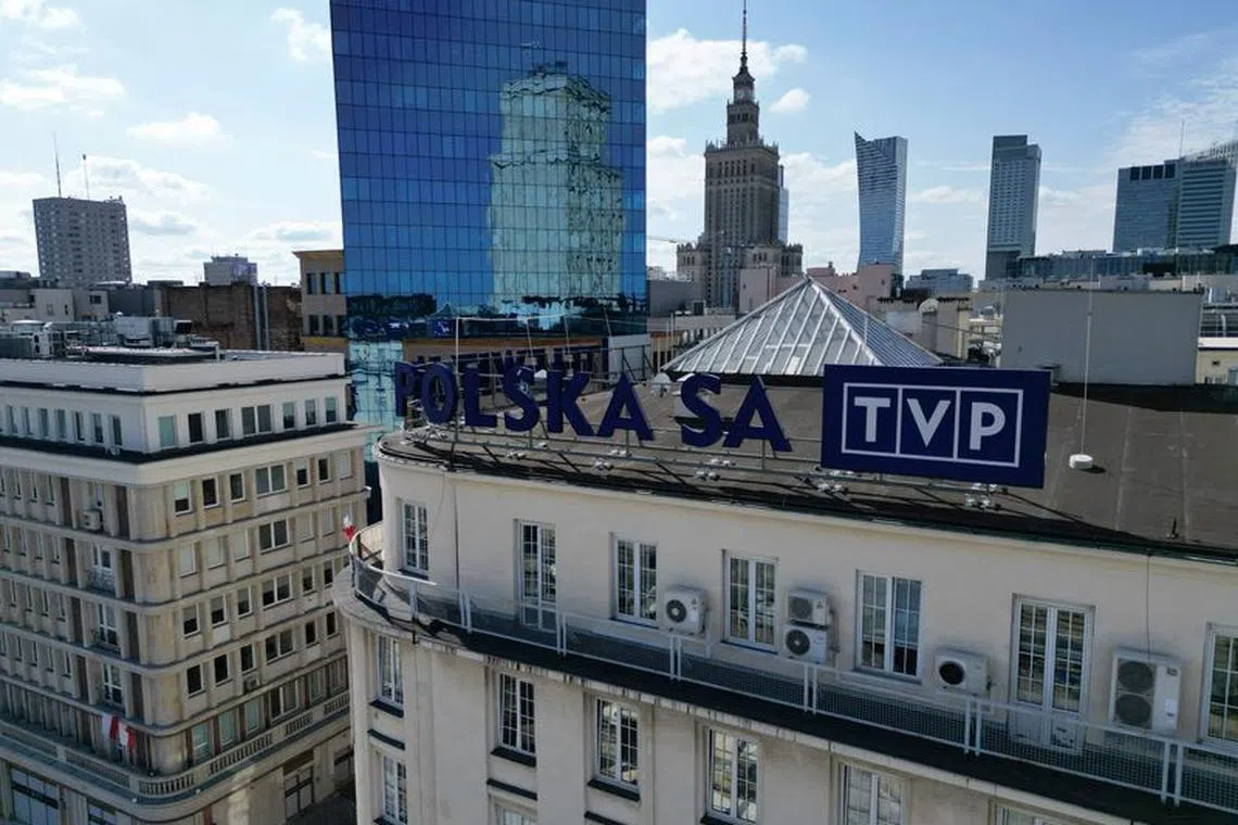 The logo of TVP Telewizja Polska SA, Polish state television and media outlet, is seen on the roof of the company's building, as the city skyline is seen in the distance in Warsaw, Poland, September 25, 2023. REUTERS/Kacper Pempel/File Photo