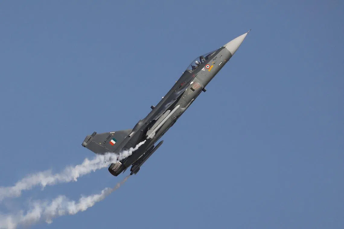 FILE PHOTO: An Indian Air Force (IAF) light combat aircraft \"Tejas\" performs during the Indian Air Force Day celebrations at the Hindon Air Force Station on the outskirts of New Delhi, India, October 8, 2019. REUTERS/Anushree Fadnavis/File Photo