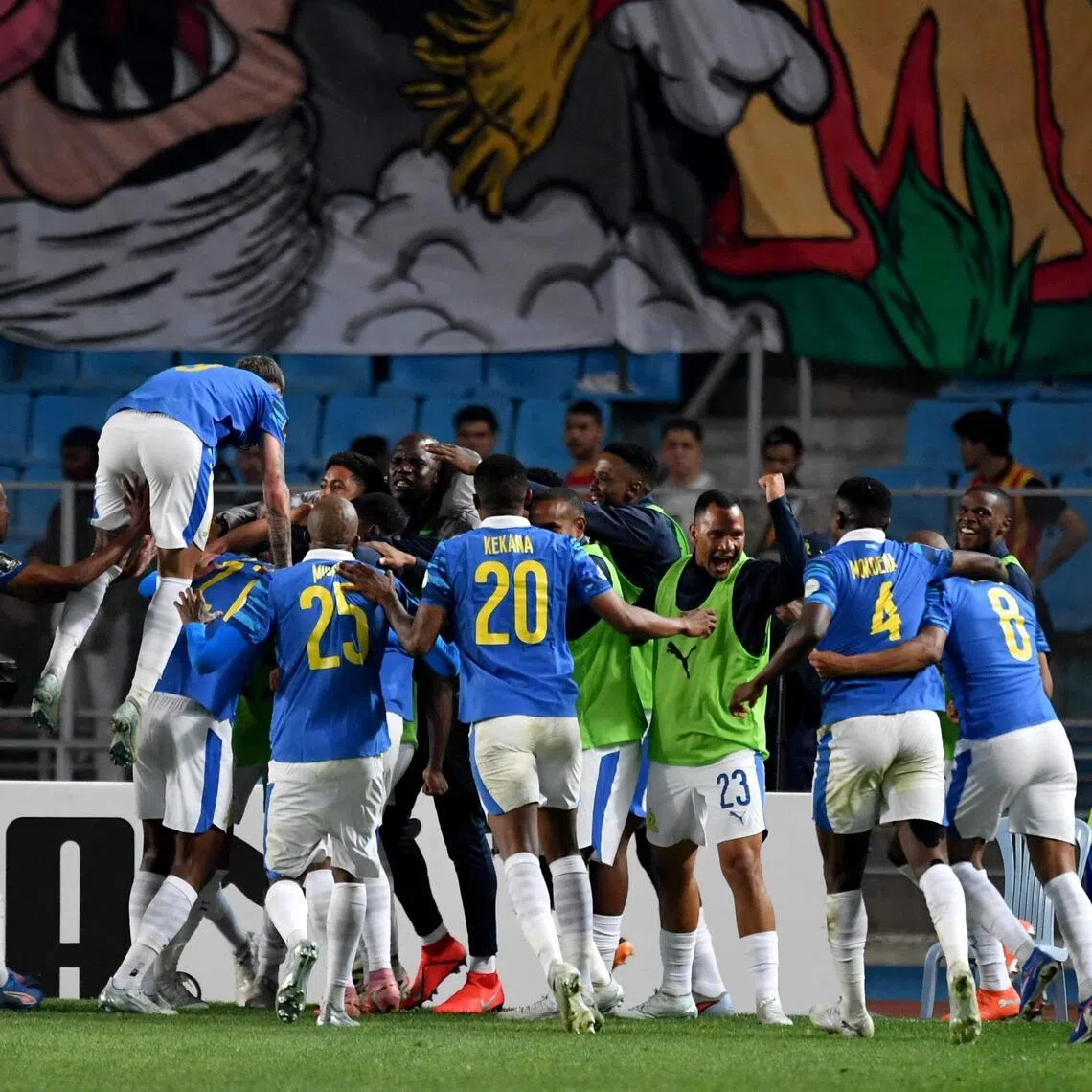 Mamelodi Sundowns players celebrate after scoring the only goal against Esperance Sportive de Tunis in the CAF Champions League semi-finals first leg at the Hammadi Agrebi Stadium in Rades on April 12, 2026.