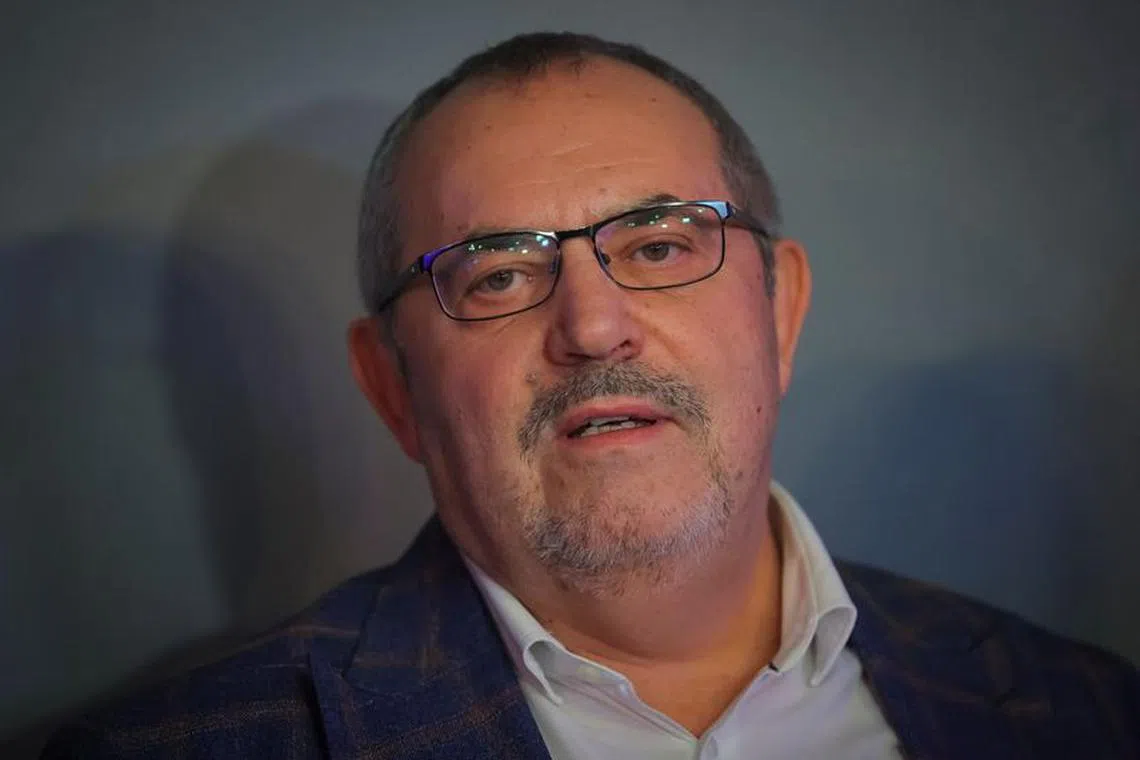 Boris Nadezhdin, a representative of Civil Initiative political party who plans to run for Russian president in the March 2024 election, looks on as he meets wives of mobilised soldiers in Moscow, Russia January 11, 2024. REUTERS/Evgenia Novozhenina