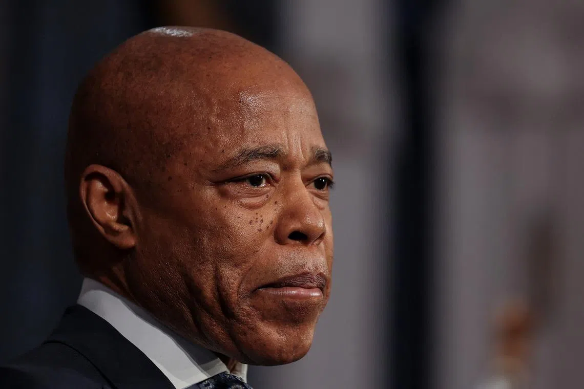 FILE PHOTO: New York City Mayor Eric Adams looks on during a press conference at City Hall in Manhattan in New York City, U.S., March 24, 2025. REUTERS/Jeenah Moon/File Photo
