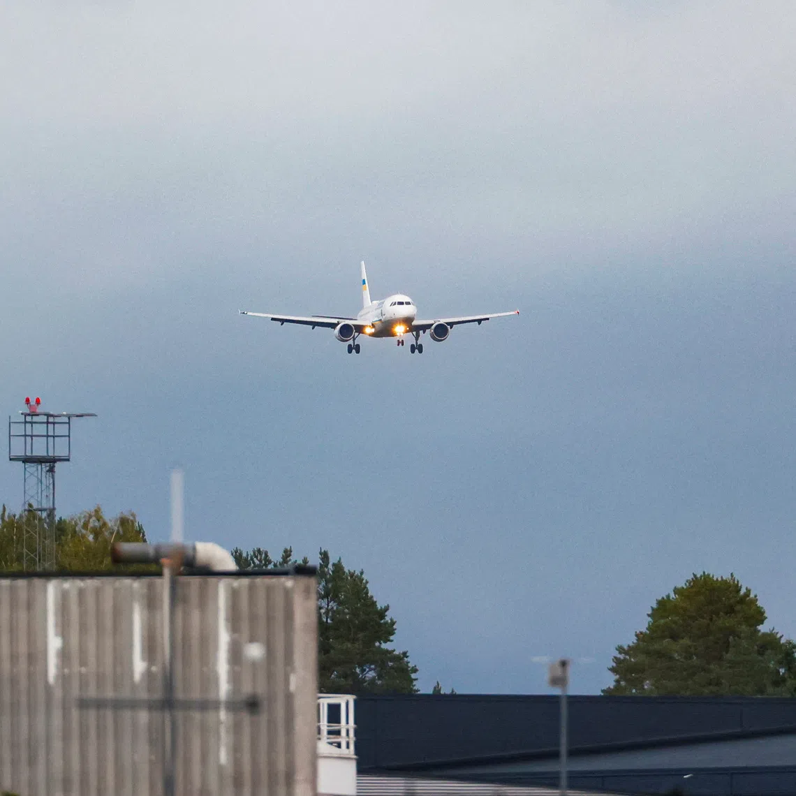 A plane carrying Ukrainian President Volodymyr Zelensky landing in Gardermoen, Norway, on Sept 8. Zelensky’s plane was almost hit by a drone when taking off from Moldova, said Norwegian Prime Minister Jonas Gahr Store.