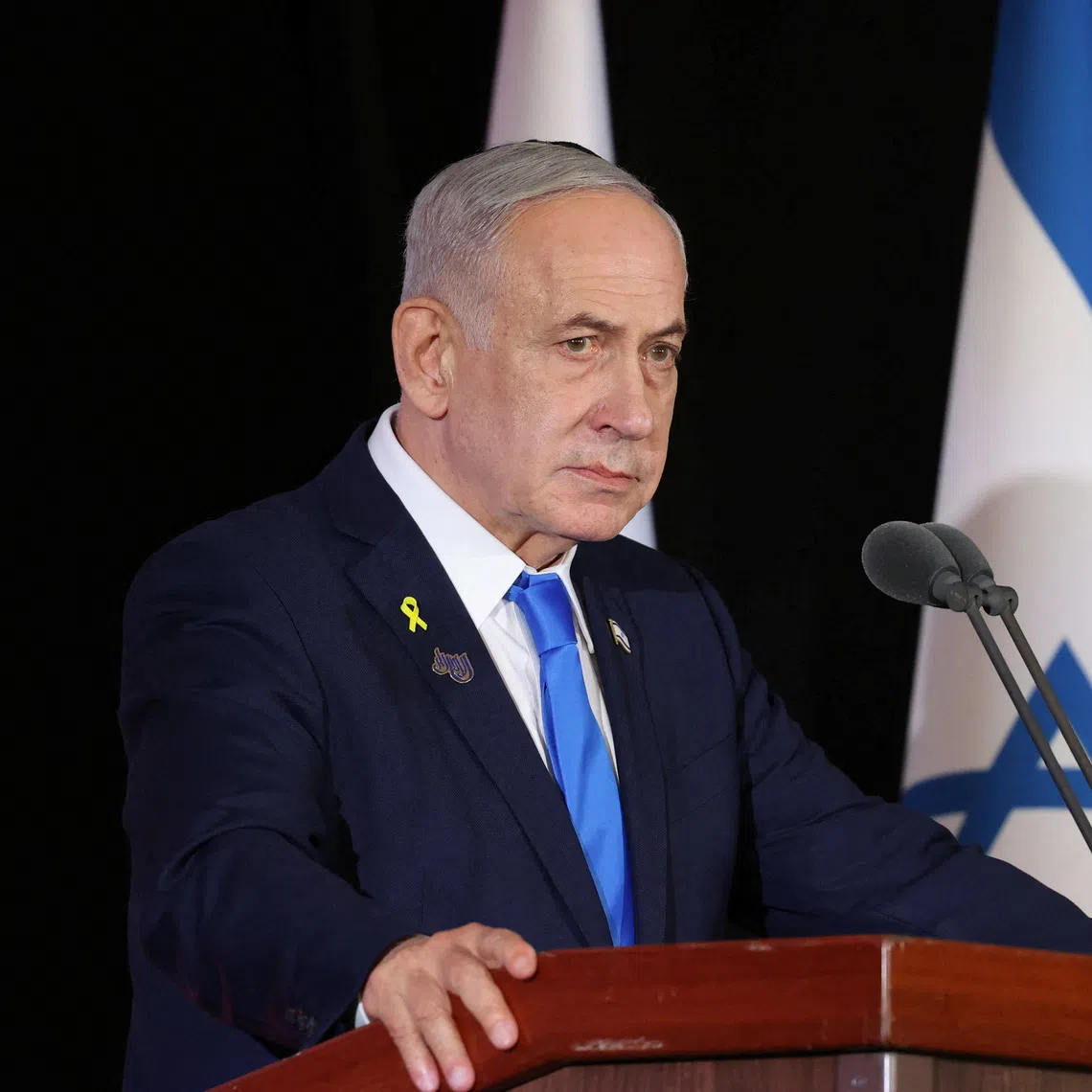 FILE PHOTO: Israeli Prime Minister Benjamin Netanyahu participate in the state memorial ceremony for the fallen of the Iron Swords War on Mount Herzl. In Jerusalem on 16 October 2025    Alex Kolomoisky/POOL/Pool via REUTERS/ File Photo
