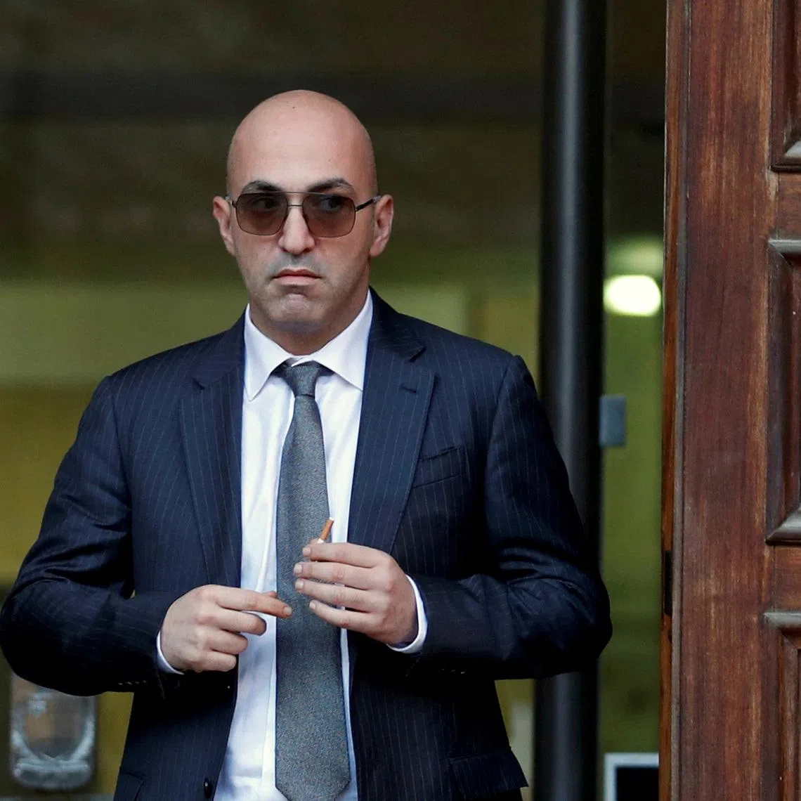 FILE PHOTO: Maltese businessman Yorgen Fenech, who was arrested in connection with an investigation into the murder of journalist Daphne Caruana Galizia, leaves the Courts of Justice in Valletta, Malta, November 29, 2019. REUTERS/Yara Nardi/File Photo