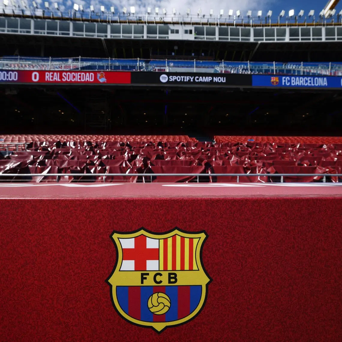 FILE PHOTO: Soccer Football - Visit of FC Barcelona's new Spotify Camp Nou, Barcelona, Spain - September 23, 2025 General view of the FC Barcelona logo during the visit REUTERS/Albert Gea/File Photo