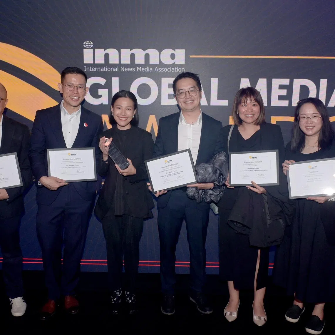 (From left) Straits Times associate editor Jeremy Au Yong, EMTM head of business planning and integration Daniel Buenas, deputy editor of content and solutioning at SPH Media's Brand Newsroom Genevieve Chan, Chinese Media Group lead product manager Eddie Hong Hao, SPH Media assistant vice-president of human resources Rebecca Vu and Zaobao Schools editor Lim Xin Hui at the 2026 INMA Global Media Awards ceremony in Berlin. 