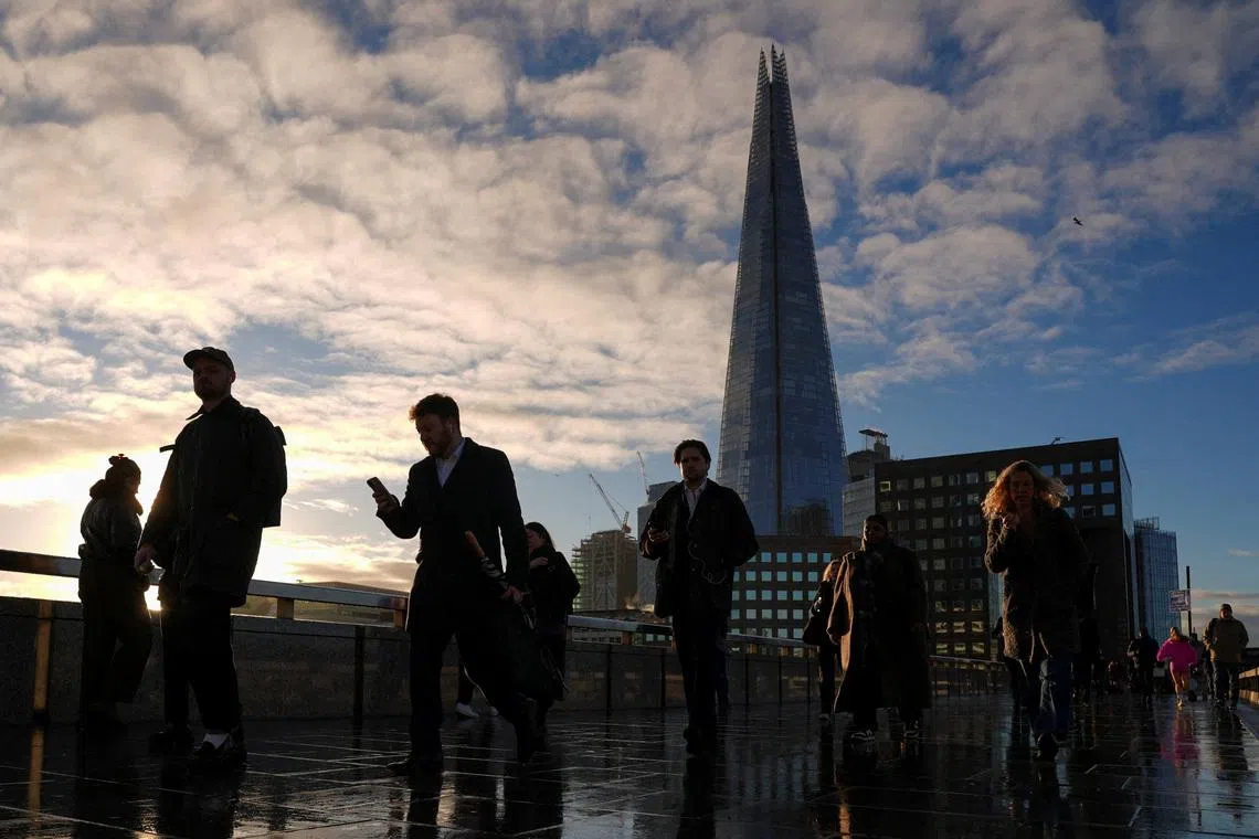UK firms cut jobs at fastest pace in five years, wages cool