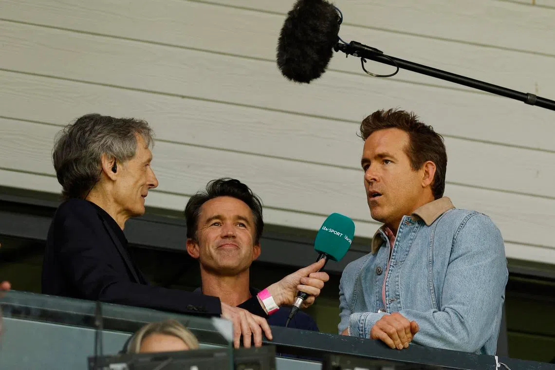 Soccer Football - Championship - Wrexham v West Bromwich Albion - SToK Racecourse, Wrexham, Wales, Britain - August 16, 2025 Actors and Wrexham owners Ryan Reynolds and Rob McElhenney speak to the media before the match Action Images via Reuters/Jason Cairnduff