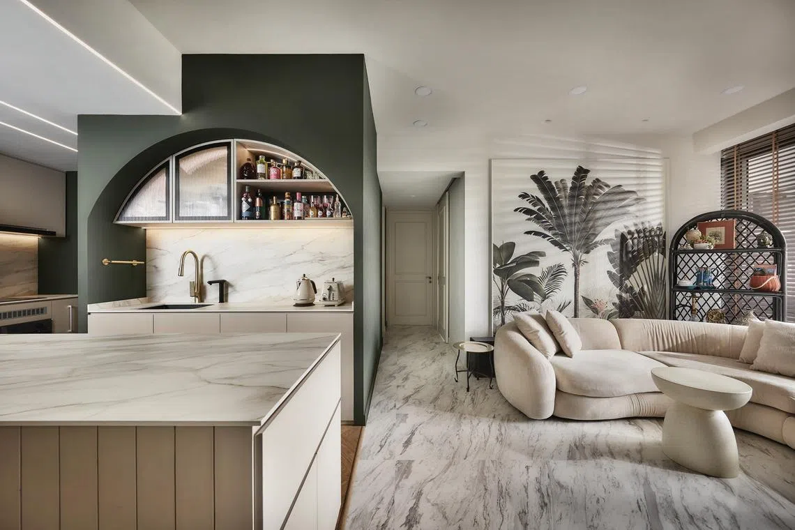 This tropical-themed two-bedroom apartment feels like a holiday getaway.