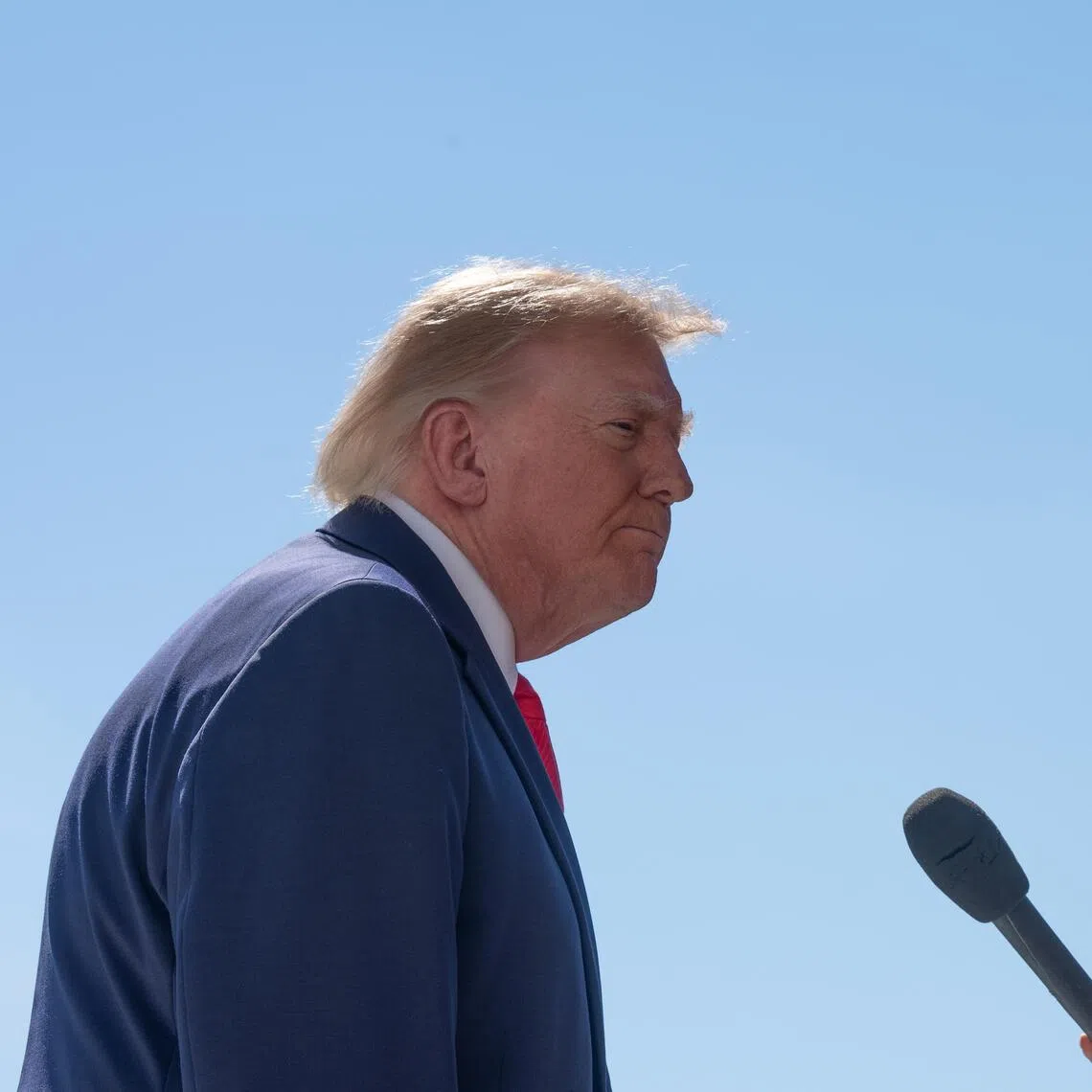 US President Donald Trump speaking to the media on Oct 1, on the South Lawn of the White House, before boarding Marine One.