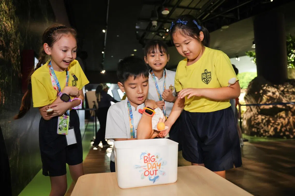 Pupils from St Francis Methodist School (International) playing the Seahorse Nursery game at Big Day Out at Singapore Oceanarium.
