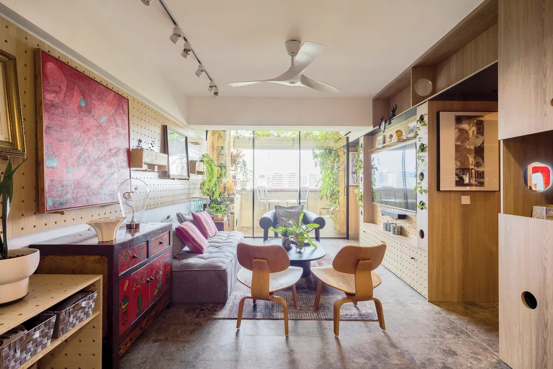 Home owner Winston Lim shares his compact but cleverly designed Pasir Ris flat with two cats.
