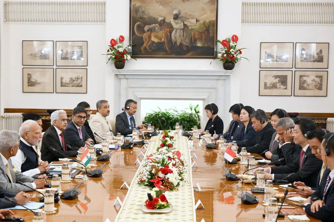 Prime Minister Lawrence Wong with Indian Prime Minister Narendra Modi at a delegation meeting at Hyderabad House in New Delhi on Sept 4. 