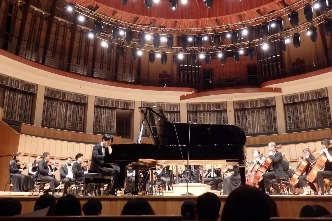 Singaporean pianist William Wei playing with the Shanghai Nine Trees Philharmonic Orchestra on Oct 26. 