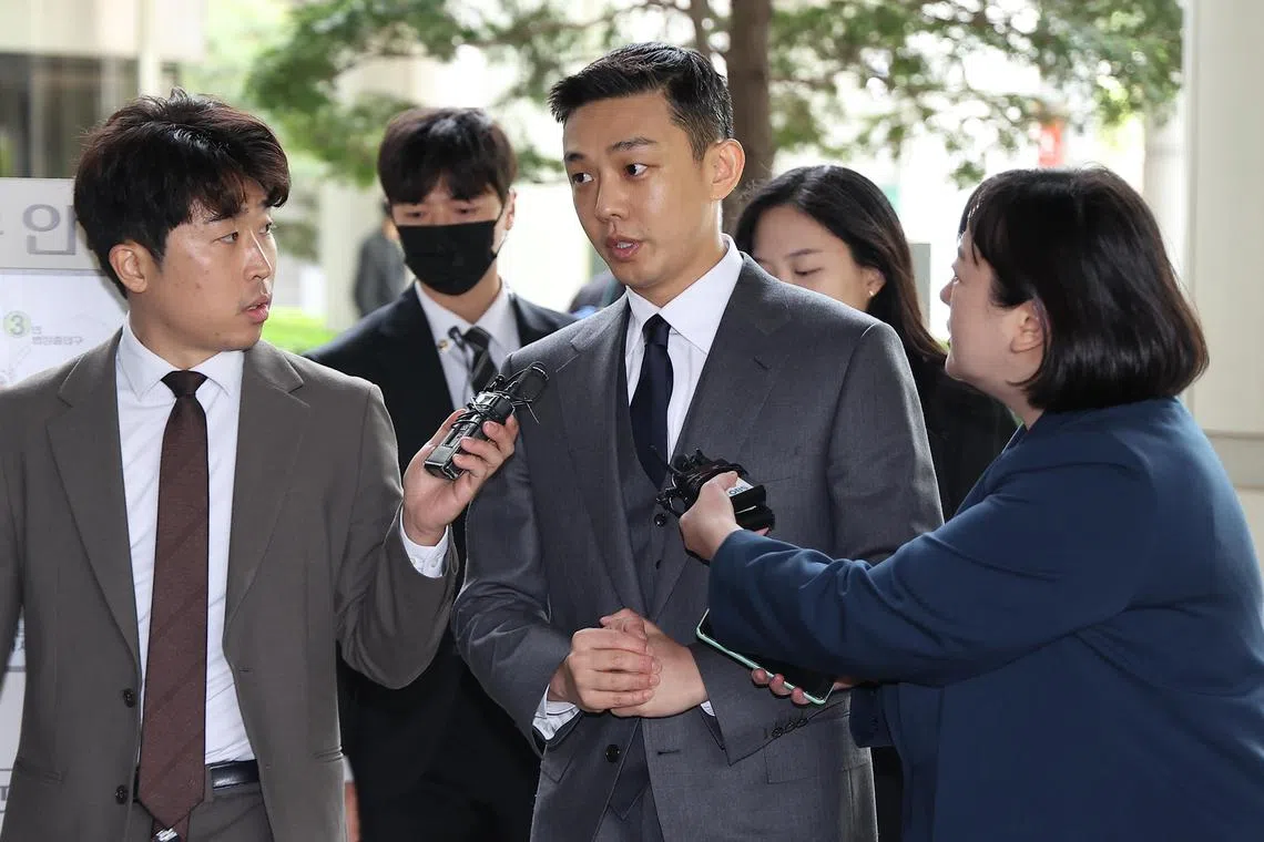 Actor Yoo Ah-in answers reporters' inquiries upon arriving at the Central District Court in Seoul, South Korea, 16 April 2024, to attend a hearing regarding allegations of his persistent drug use. EPA-EFE/YONHAP SOUTH KOREA OUT