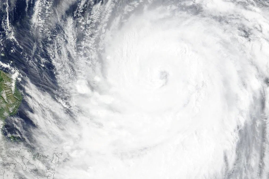 A satellite image shows Typhoon Bavi as it churns in the Pacific Ocean, July 9, 2026. NASA WORLDVIEW/Handout via REUTERS