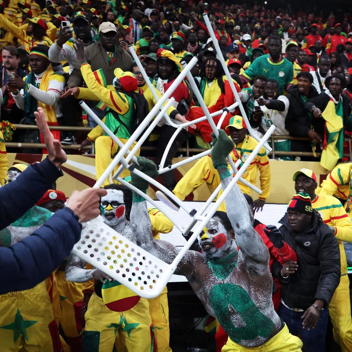 FILE PHOTO: Soccer Football - CAF Africa Cup of Nations - Morocco 2025 - Final - Senegal v Morocco - Prince Moulay Abdellah Stadium, Rabat, Morocco - January 18, 2026 Senegal fan clashes with security as fans invade the pitch after Morocco were awarded a penalty following a VAR review REUTERS/Siphiwe Sibeko/File Photo