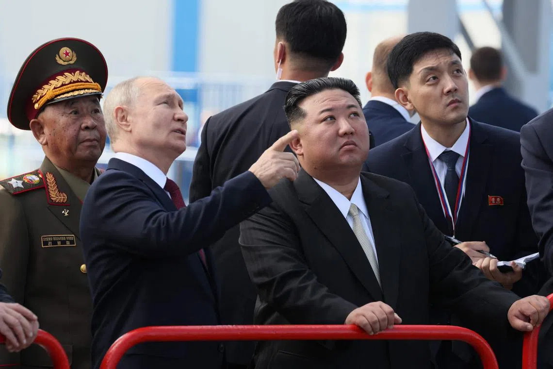 (FILES) In this pool photo distributed by Sputnik agency, Russia's President Vladimir Putin (centre L) and North Korea's leader Kim Jong Un (centre R) visit the Vostochny Cosmodrome in Amur region on September 13, 2023. North Korean leader Kim Jong Un on June 12, 2024 hailed his country's ties with Russia, saying the two nations were "invincible comrades-in-arms", amid reports President Vladimir Putin will visit Pyongyang imminently. (Photo by Mikhail Metzel / POOL / AFP)