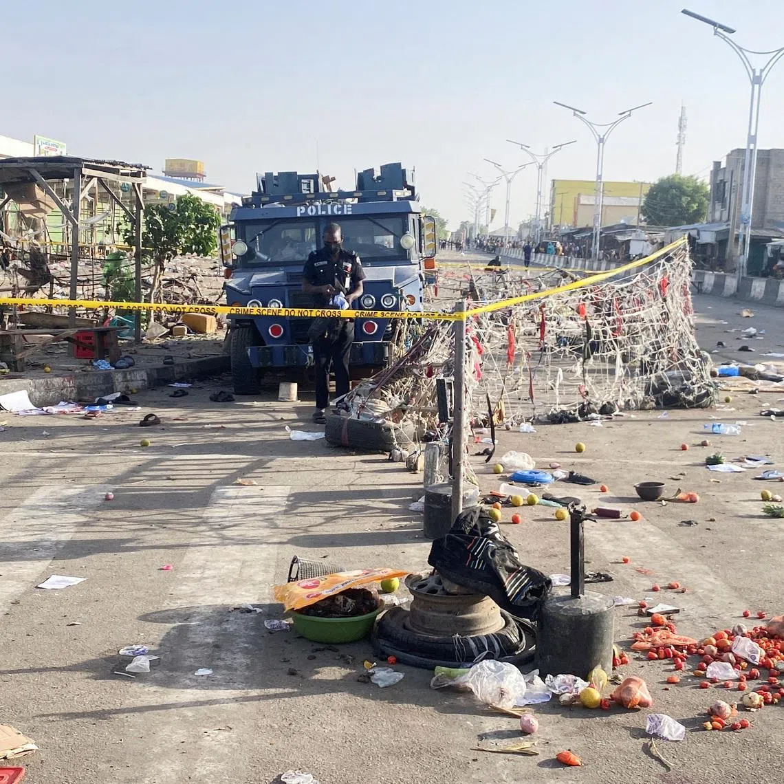 A Nigerian police truck stands at the deserted Maiduguri Monday Market the morning after multiple explosions struck the northeastern city of Maiduguri, Borno State, Nigeria, March 17, 2026. REUTERS/Ahmed Kingimi