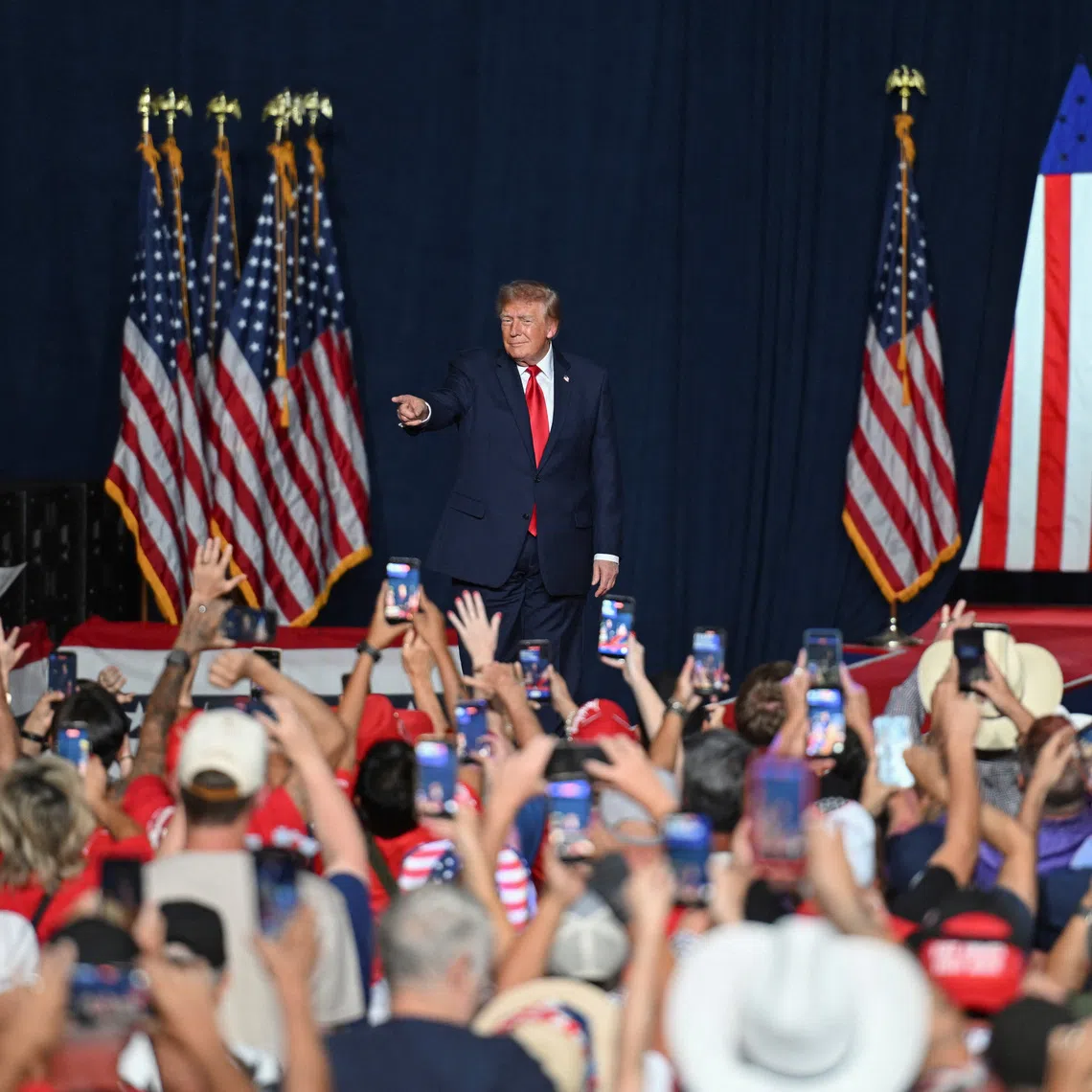 US President Donald Trump walks on stage during a campaign event ahead of the midterms, in San Antonio, Texas, US, October 7, 2026. REUTERS/Callaghan O'Hare