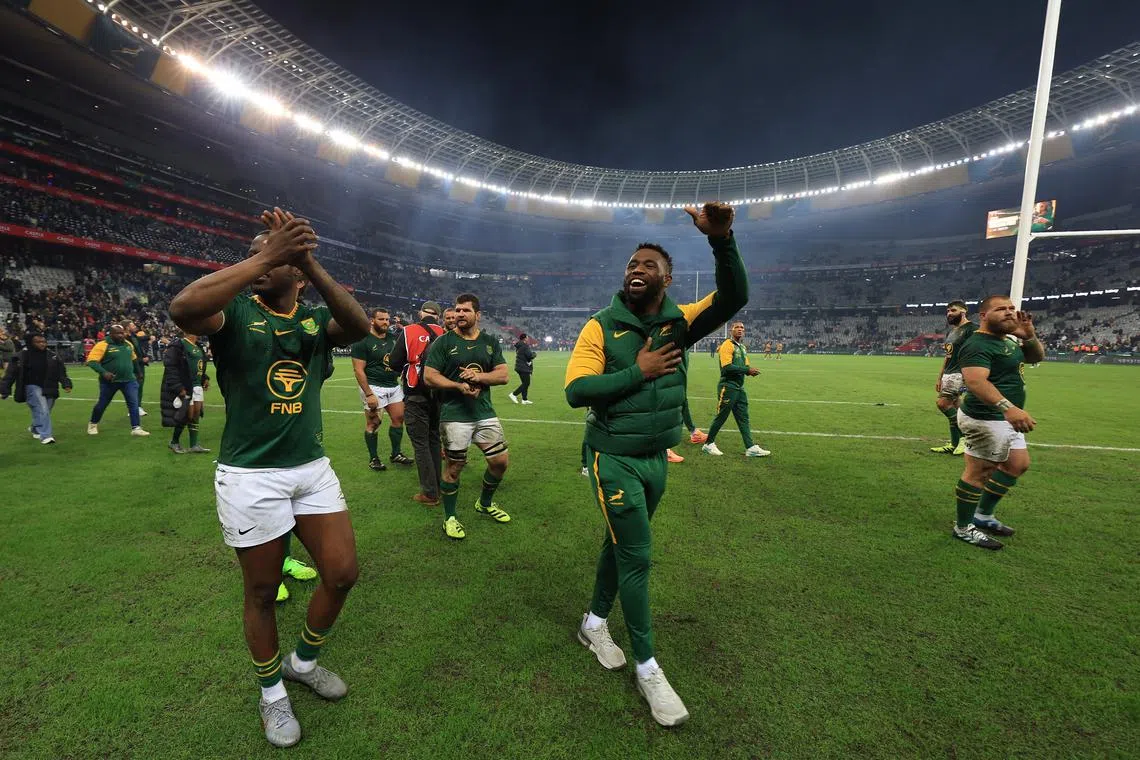 Rugby Union - Rugby Championship - South Africa v Australia - DHL Stadium, Cape Town, South Africa - August 23, 2025  South Africa's Siya Kolisi celebrates with teammates after the match REUTERS/Esa Alexander