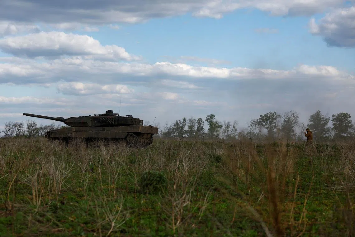 File Photo: Ukrainian serviceman Andrii, a tank company commander of the 21st Separate Mechanized Brigade, walks to a Leopard 2A6 tank during a military exercise, amid Russia's attack on Ukraine, near a front line in Donetsk region, Ukraine May 12, 2024. REUTERS/Valentyn Ogirenko/ File Photo