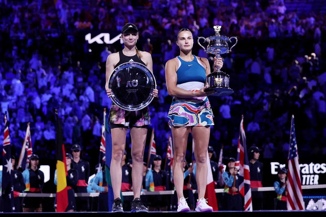 Belarus’ Aryna Sabalenka celebrating with the trophy after beating Kazakhstan’s Elena Rybakina in the Australian Open final in Melbourne on Jan 28, 2023.
