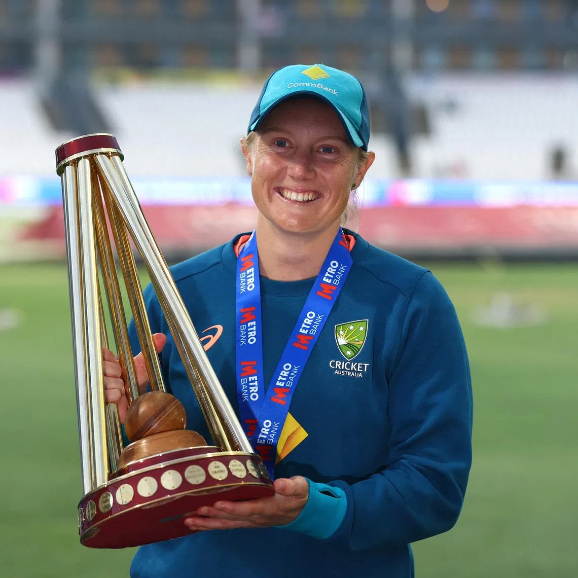 FILE PHOTO: Cricket - Women's One Day International Series - England v Australia - County Ground, Taunton, Britain - July 18, 2023 Australia's Alyssa Healy celebrates retaining the Ashes with the trophy Action Images via Reuters/Matthew Childs/File Photo