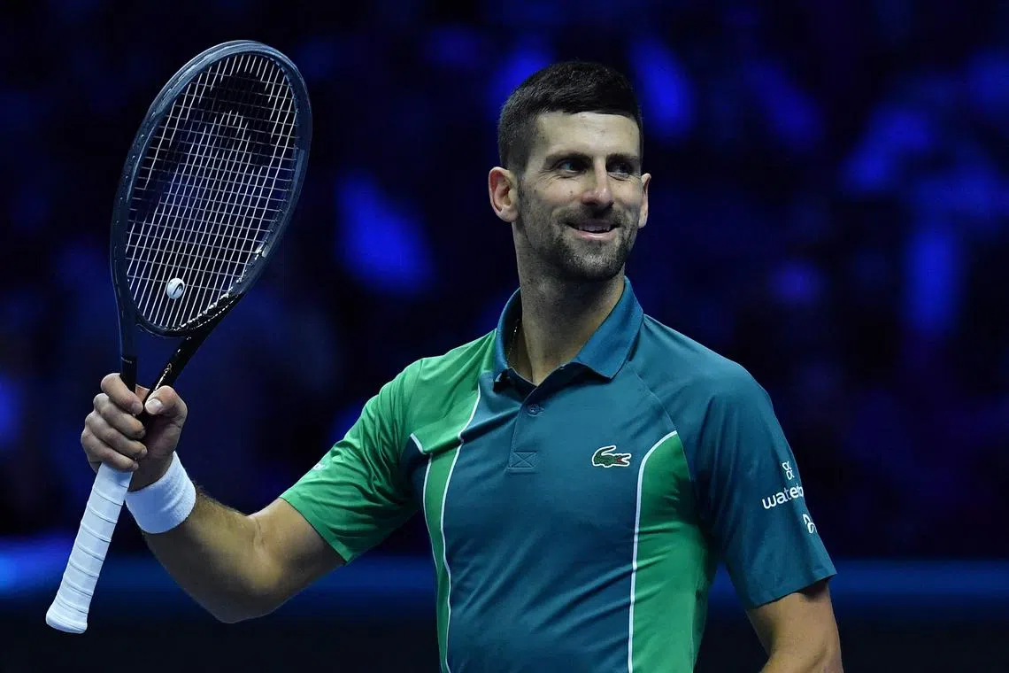 Serbia's Novak Djokovic celebrates after winning the first round-robin match against Denmark's Holger Rune at the ATP Finals tennis tournament in Turin on Nov 12.