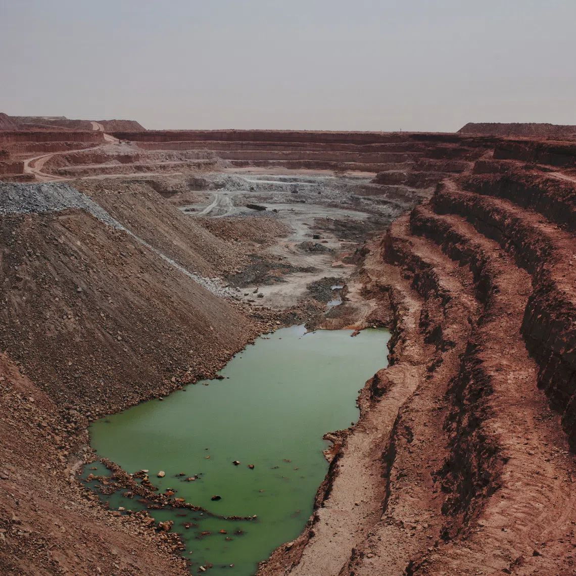 FILE PHOTO: The Tamgak open air uranium mine is seen at Areva's Somair uranium mining facility in Arlit, September 25, 2013. Picture taken September 25, 2013. REUTERS/Joe Penney/File Photo