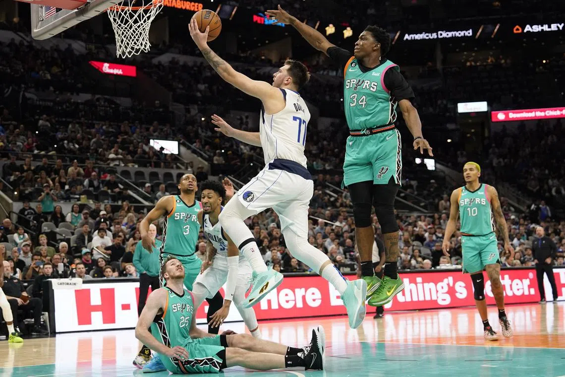 Dallas Mavericks guard Luka Doncic driving to the basket against San Antonio Spurs forward Stanley Johnson during the second half at AT&T Centre. He scored 51 points as the Mavericks outlasted the Spurs 126-125 on Saturday.