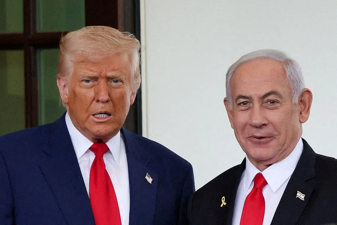 FILE PHOTO: U.S. President Donald Trump welcomes Israeli Prime Minister Benjamin Netanyahu at the entrance of the White House in Washington, D.C., U.S., April 7, 2025. REUTERS/Leah Millis/File Photo