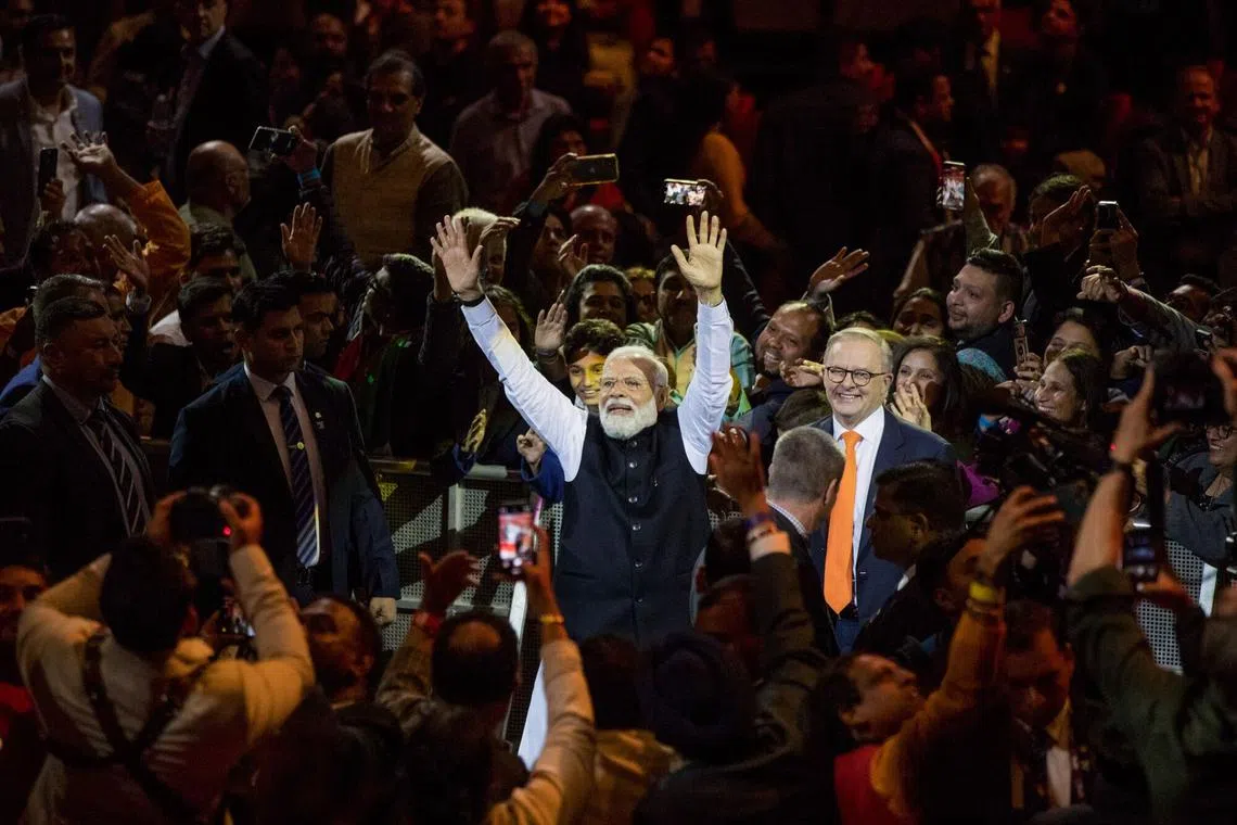 Indian PM Narendra Modi (left) and Australian PM Anthony Albanese during an event at Qudos Bank Arena in Sydney, on May 23, 2023. 