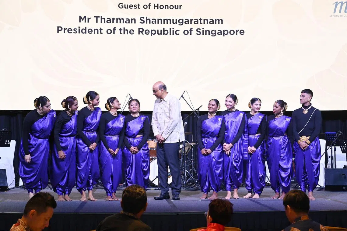 President Tharman Shanmugaratnam with performers from Sinda during the Inter Racial Religious Harmony Nite event on July 6.