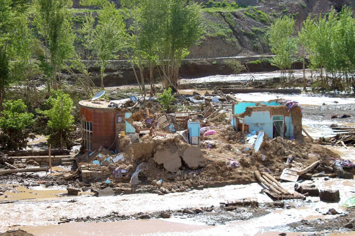 FILE PHOTO: Remainings of houses damaged by the flood are pictured in Firozkoh the capital city of Ghor Province, Afghanistan, May 18, 2024. REUTERS/Stringer/File Photo